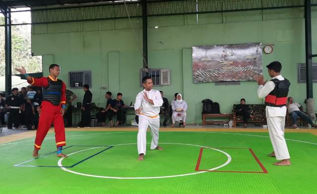 Maulana-Sean Ammar Atlit SMK Muhisa Juara Silat Antar Pelajar Kota Malang 1