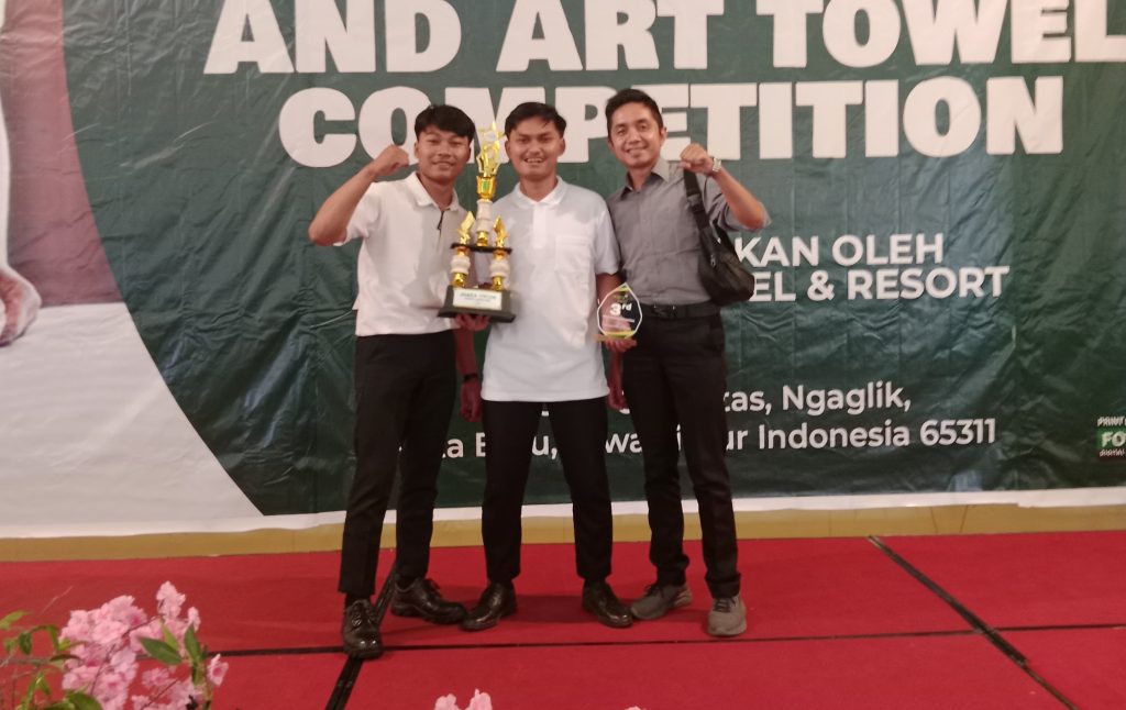 Yozzi Satria Arek SMK Mutu Gondanglegi Juara Making Bed and Art Towel Malang Raya 1