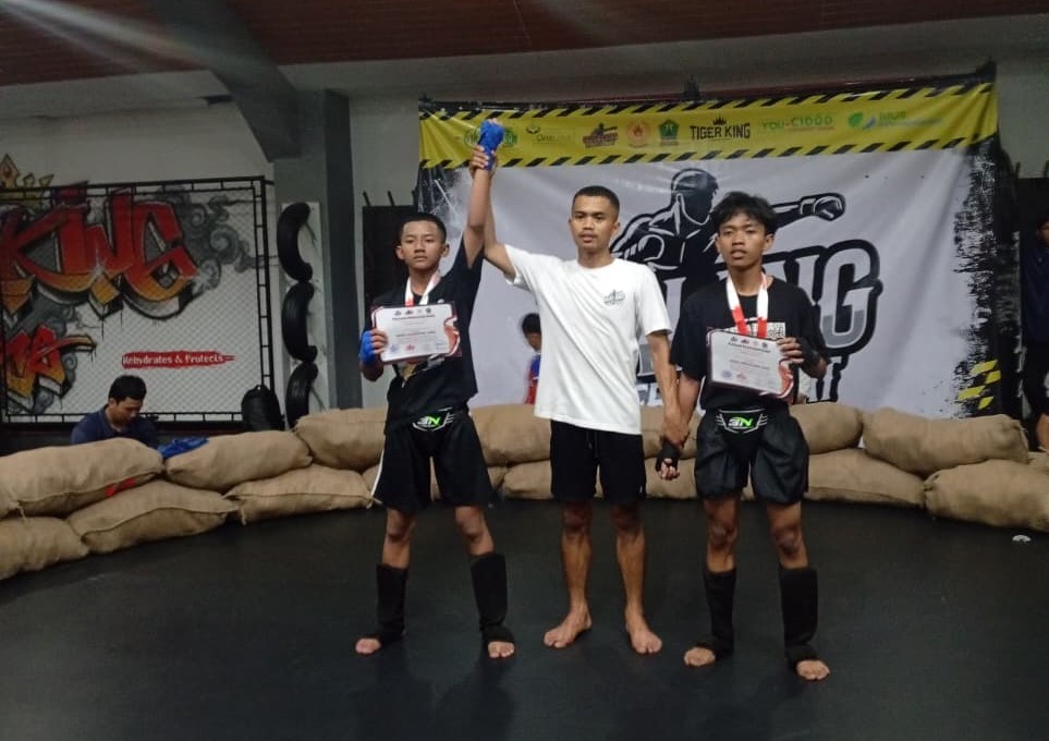 Fahat Ismail Siswa SMP M-One Sumberpucung Raih Medali Emas Kick Boxing 1