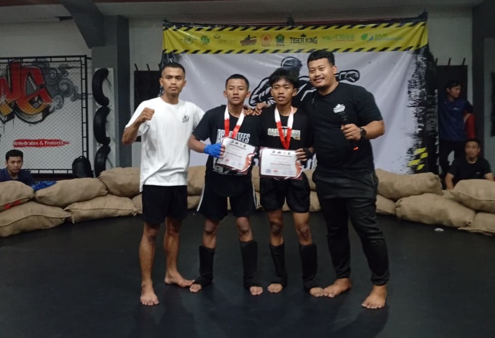 Fahat Ismail Siswa SMP M-One Sumberpucung Raih Medali Emas Kick Boxing 2