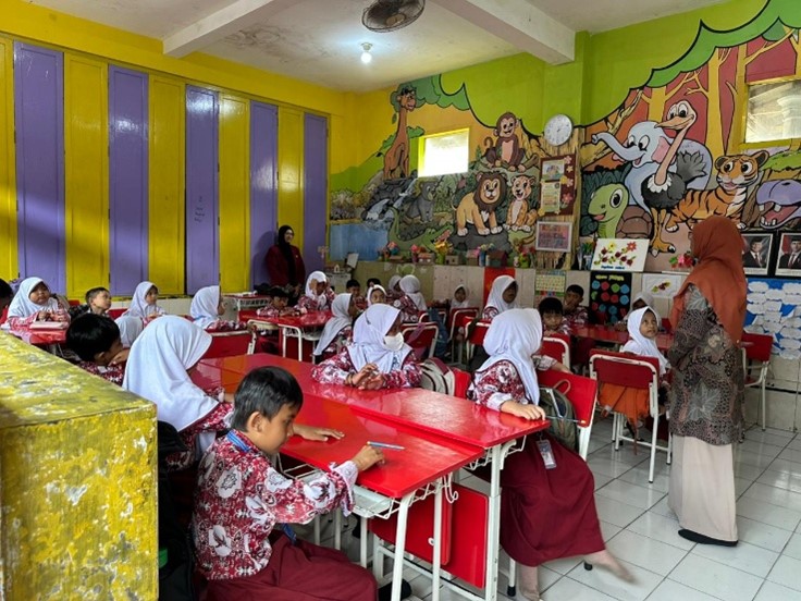 Tim Dosen PGSD UMM Terapkan Inovasi Pembelajaran BigBook Interaktif Tingkatkan Kemampuan Membaca Siswa 3